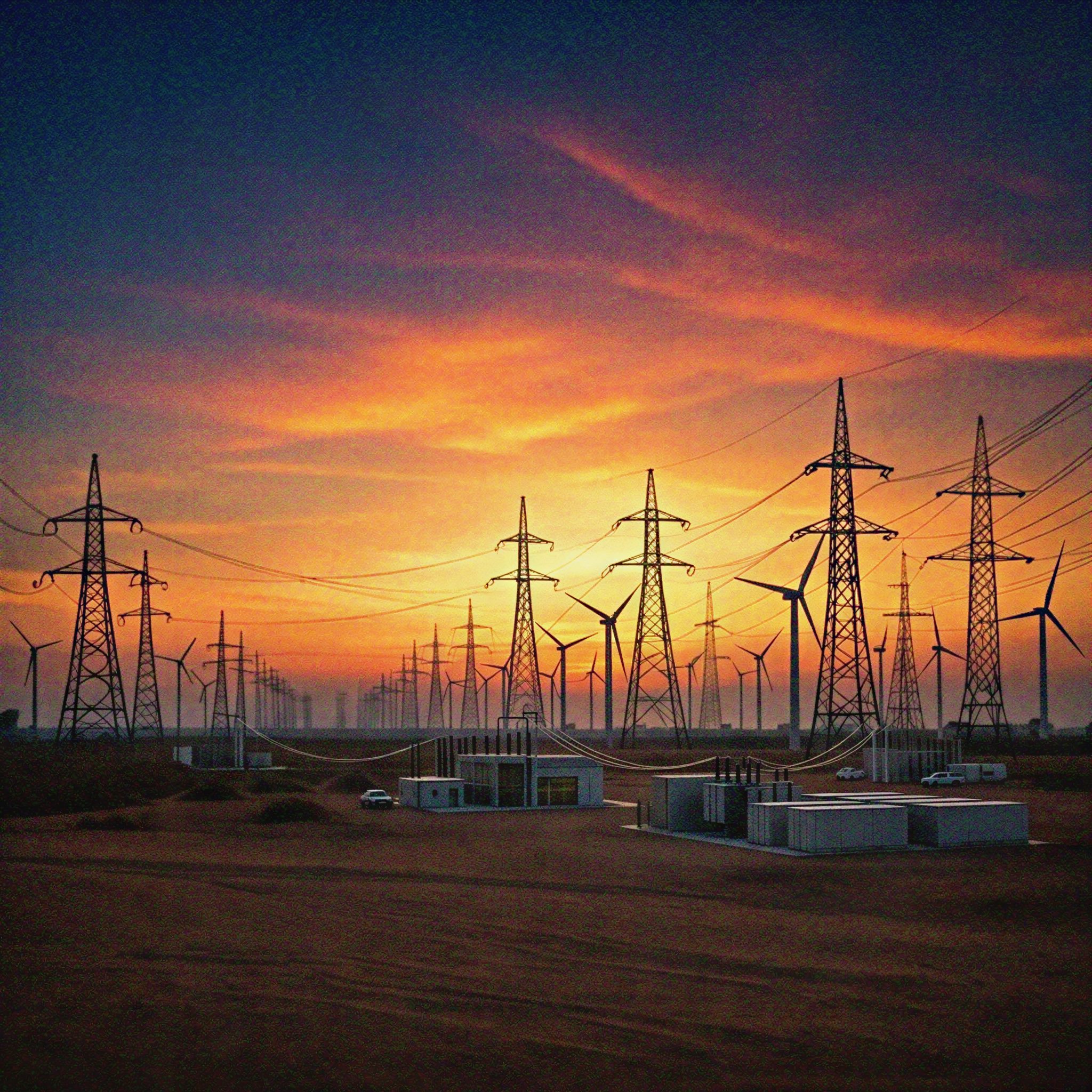 Power transmission lines across Sindh at sunset — SEPRA contact page